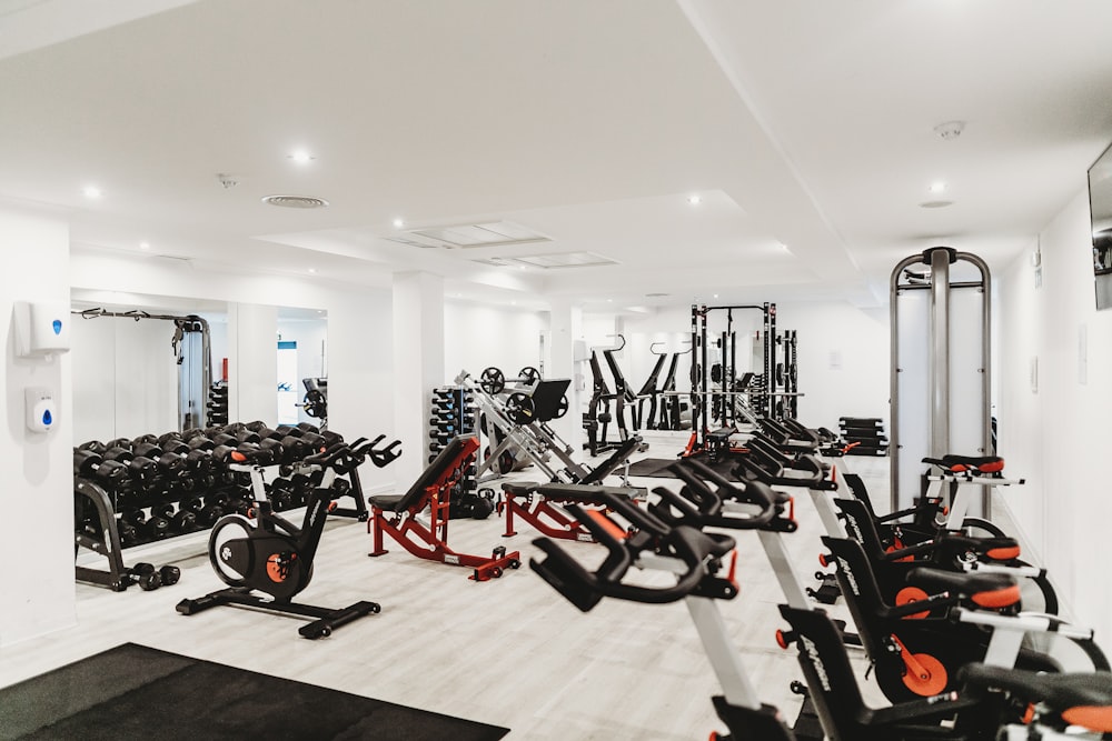 Bright training space with weights and bikes